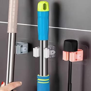 Imagem de 2 peças de suportes de esfregão brancos montados na parede, que podem armazenar vassouras, esfregões e outras ferramentas. Adequado para banheiros, escritórios e outros espaços. O design é do tipo