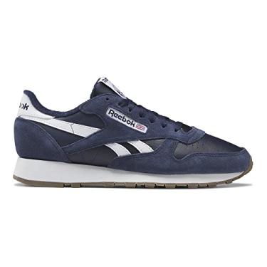 Imagem de Reebok Tênis de couro clássico unissex para adultos, Preto/vetor azul marinho/branco, 10.5 Women/9 Men