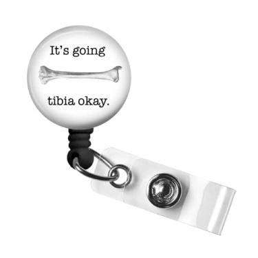 Imagem de Molinete retrátil de crachá de identificação Ortho, It's Going Tibia Okay Badge Reel, clipe giratório jacaré, 86 cm. Cordão de nylon, ID de crachá de enfermeira RN da Medical MD, porta-crachás, puxador de crachá de identificação, Original