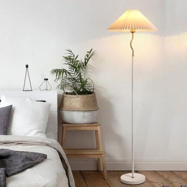 Imagem de Luminária de chão moderna e minimalista em tecido plissado, ideal para leitura em ambientes internos, seja na sala de estar, quarto ou escritório.