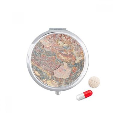 Imagem de Porta-comprimidos enferrujados com textura de ferro áspero e ferrugem, caixa de armazenamento de medicamentos