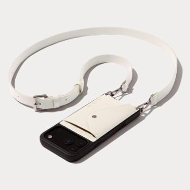 Imagem de Bandolier Hailey Capa de celular tipo carteira transversal para iPhone 17 Pro. 100% couro de seixo genuíno com ferragens douradas. Alça ajustável e removível. Suporte de cartão flip expansível. Marfim