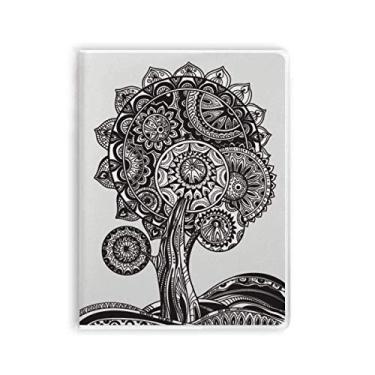 Imagem de Caderno de flores brancas e pretas com estampa de girassol, capa de goma