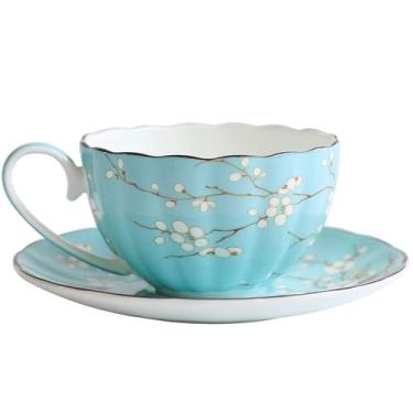 Imagem de Xícara de chá de leite, chá da tarde, xícara de café, pires, prato plano, cerâmica, criativo, frutas, sobremesa, prato preto, decoração de hotel, xícara de chá