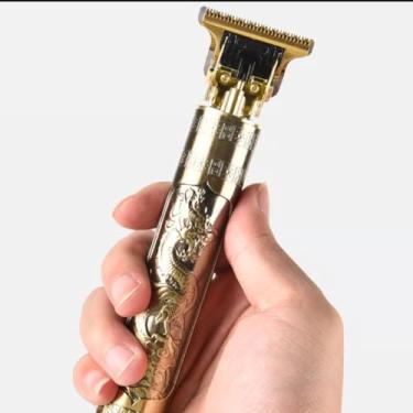 Imagem de "Máquina de Cortar Cabelo Profissional Sem Fio Recarregável Aparador Barba Pezinho com 4 Pentes e Óleo "