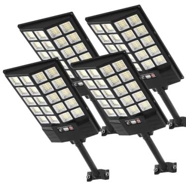 Imagem de JOISTOON Luzes de rua solares de 4 peças à prova d'água, luzes LED 6500K com sensor de movimento, holofotes solares com iluminação comercial do crepúsculo ao amanhecer remoto para caminho de quintal