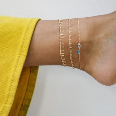 Imagem de Tornozeleira dourada para mulheres com borla