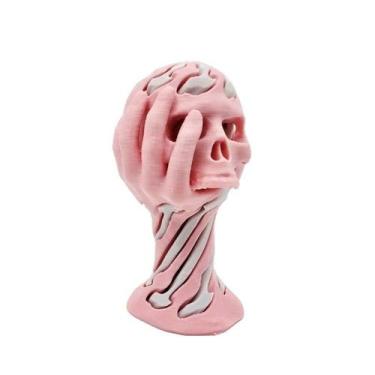 Imagem de Brinquedo de descompressão em forma de caveira em resina rosa e branca