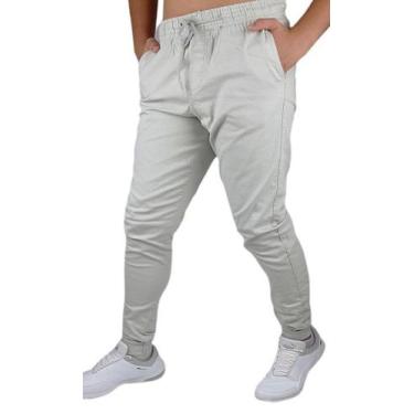 Imagem de calça jeans jogger masculina jeans rasgado, sarja com elastico e bolso