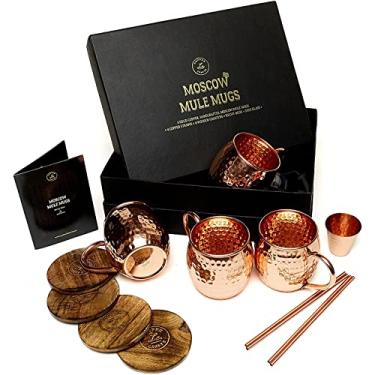 Imagem de Conjunto de canecas de cobre Moscow Mule - 4 canecas de cobre autênticas feitas à mão (473 ml) com copo de shot de 60 g, 4 canudos, 4 porta-copos de madeira maciça e livro de receitas - caixa de