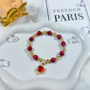 Imagem de Pulseira de contas vermelhas com berloques de raposa design elástico trazendo riqueza e boa sorte para uso diário, presente de feriado