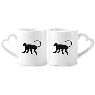 Imagem de Conjunto de canecas de porcelana de casal com desenho de animal de macaco preto com alça de coração