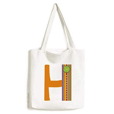 Imagem de Bolsa de lona com estampa de frutas laranja e alfabeto H; bolsa de compras casual