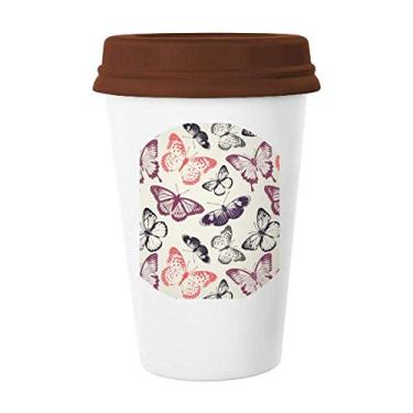 Imagem de Caneca Borboleta em fundo rosa pálido Caneca de café Copo de cerâmica Tampa de copo