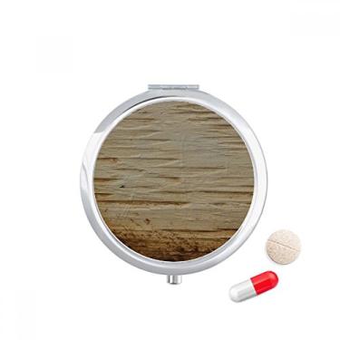 Imagem de Porta-comprimido vintage com textura de ferro áspero enferrujado, caixa de armazenamento de remédios