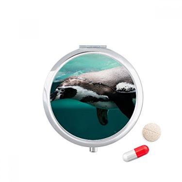 Imagem de Caixa de armazenamento de medicamentos com imagem de pinguim azul profundo oceano