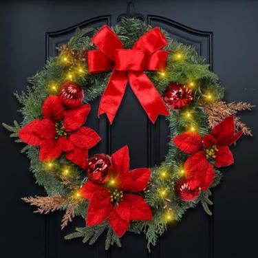 Imagem de Guirlanda de Natal com poinsétia, enfeites de bola de laço vermelho, decorações de Natal, guirlandas de porta da frente para festa ao ar livre, interior, mesa de parede, decoração de casa