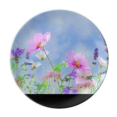 Imagem de Prato de jantar decorativo de porcelana salver com fundo azul roxo e flores rosa