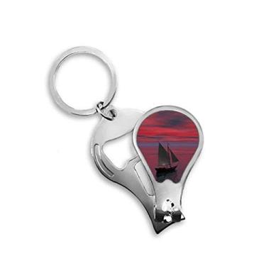 Imagem de Cortador de unhas com imagem de pessoas céu vermelho oceano barco céu vermelho abridor chaveiro tesoura