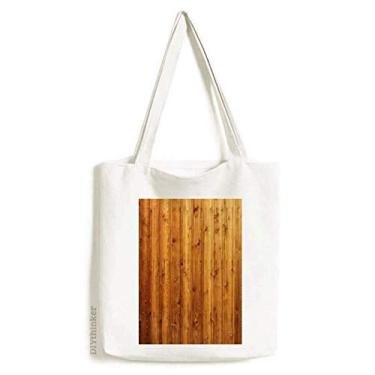 Imagem de Sacola de madeira laranja com textura de papel de parede e bolsa de compras casual