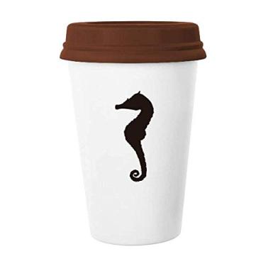Imagem de Caneca de cerâmica preta com contorno da vida marinha do hipopótamo e vidro para beber café