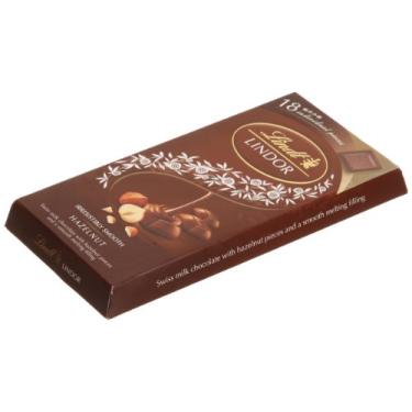 Imagem de Chocolate ao Leite com Pedaços de Avelãs e Recheio Cremoso Lindor Caixa 100g Lindt