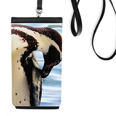 Imagem de Bolsa carteira para celular com imagem de pinguim da Antártica do oceano, bolso preto