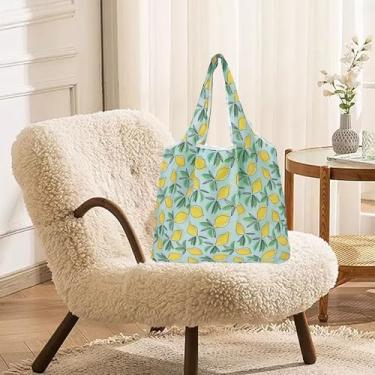 Imagem de Sacola de compras reutilizável dobrável no bolso, sacola ecológica à prova d'água e lavável na máquina, bolsa compacta reciclada para mantimentos diários, viagens, produtos e armazenamento de limão