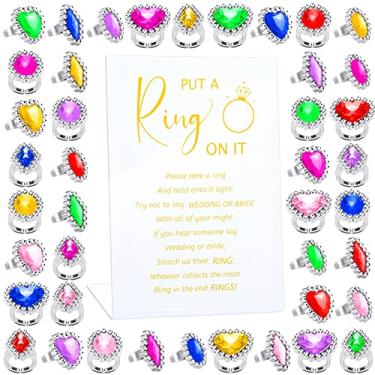 Imagem de Jogo de chá de panela Put a Ring on It com 100 peças de anéis falsos, jogos de chá de casamento, anéis de plástico para jogo de chá de panela, regras do jogo Don't Say Bride Placa de acrílico para convidados, decoração de casamento e noivado, Plástico, plástico