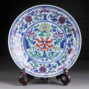 Imagem de Prato de porcelana antiga de porcelana pintada à mão em azul pastel e branco prato de cerâmica para pendurar artesanato