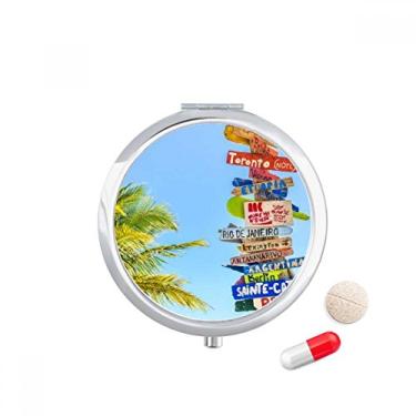 Imagem de Caixa de armazenamento de remédios Guidepost com nuvens brancas e céu, dispensador de comprimidos