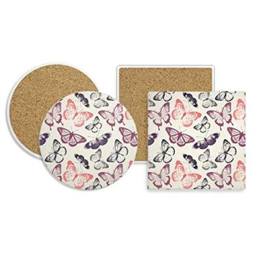 Imagem de Borboleta em fundo rosa pálido porta-copos suporte de caneca absorvente conjunto base de cortiça de pedra
