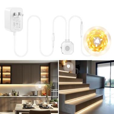 Imagem de GXILEE Faixa de luz LED com sensor de movimento, fita de LED quente flexível ativada por movimento branco com temporizador ajustável e fonte de alimentação UL para decoração sob armário, escadas
