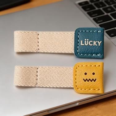 Imagem de Organizador de enrolador de cabos de couro, lindos adesivos de ícone de desenho animado, envoltório de cabo compacto para fones de ouvido e dados, mesa de viagem, armazenamento doméstico, Lucky