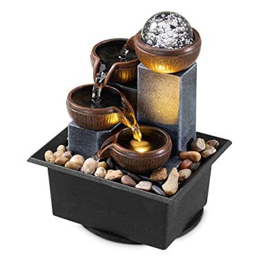Imagem de Fonte de mesa 4 níveis de mesa fonte de meditação cachoeira fonte interna escritório casa relaxar fonte de mesa piscina inclui muitas pedras naturais de rio luzes LED bola de bolha decorativa fixa