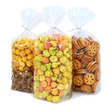 Imagem de Oueliche 100 unidades de sacos de celofane de plástico transparente de 17 x 11,6 polegadas com laços torcidos de 10 cm, ótimos para dar de presente ou lembrancinhas de festa, pão, biscoito, doces,