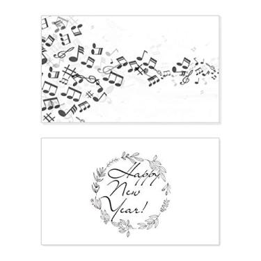 Imagem de Notas musicais torcidas pretas para festivais de ano novo, cartão de felicitações, mensagem de abençoar presente