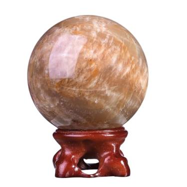 Imagem de Rockcloud Bola de cristal de pedra da lua laranja natural com suporte de resina, escultura de bola decorativa de esfera de cristal polido para meditação Fengshui decoração de casa, 5 a 6 cm