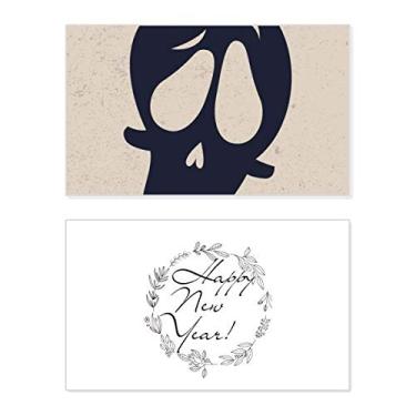 Imagem de Cartão de felicitações Dia das Bruxas com caveira torcida e mensagem de abençoar presente