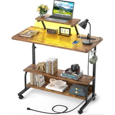Imagem de Mesa de pé ajustável em altura com tomadas elétricas e luzes LED – Mesa de pé manual de 81 cm com suporte para monitor e prateleiras de armazenamento, pequena mesa móvel com rodinhas para computador,