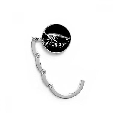 Imagem de Gancho de mesa preto Dinosaur Bone Bones com fecho decorativo e gancho dobrável