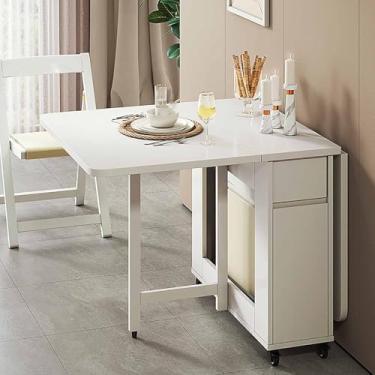 Imagem de HYUIO Mesa de jantar dobrável de madeira para cozinha com rodas - Mesa extensível retangular para pequenos espaços, design dobrável para sala de estar e sala de jantar 130 cm + 4 cadeiras