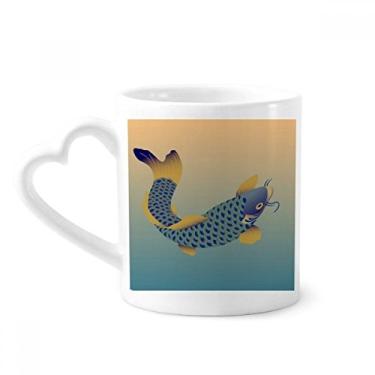 Imagem de Caneca de café de cerâmica azul com tema de peixe de pintura Cultura copo de coração de vidro