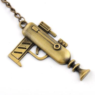 Imagem de Chaveiro: trompete de latão, mini instrumento musical