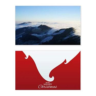 Imagem de Mountain Sky Clouds Fog Nature Town Holiday Merry Christmas Cartões de parabéns Mensagem de Natal