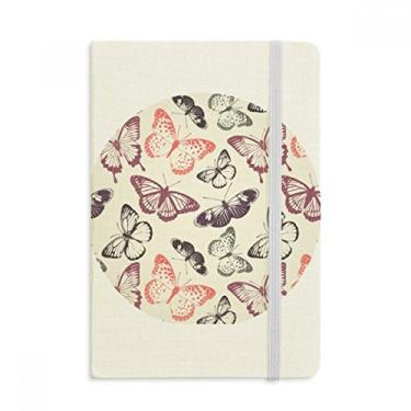 Imagem de Caderno de Borboleta em fundo rosa pálido oficial de tecido capa dura diário clássico