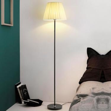 Imagem de Luminária de chão em tecido macio, ideal para leitura e proteção ocular. Design moderno e minimalista, com acabamento vertical, clássica nas cores branca e preta. Luminária alta e elegante p