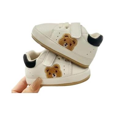 Imagem de Sapatos Para Bebês Com Design De Urso Em Cartoon, Isolamento De Algodã