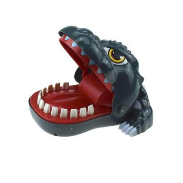 Imagem de Brinquedo mordendo dentes de desenho animado de dinossauro fofos de pl