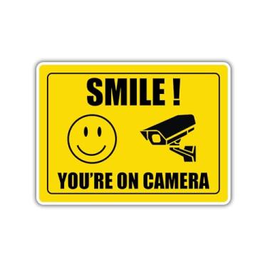 Imagem de STICOASIS - Adesivo de vinil Smile You're On Camera [17 x 12,8 cm), placa de câmera de segurança de vigilância por vídeo para casa, ao ar livre, negócios, alerta de garagem, CCTV (amarelo e preto)